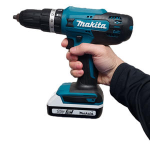 Makita Taladro 13mm Percutor 18v  2 Baterias 1.5ah 1 Cargador + Maletin